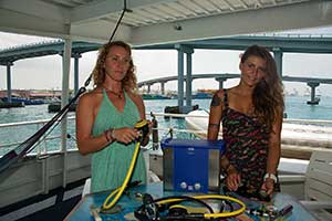 Clean scuba equipment with ultrasonic cleaning
